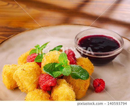 Fried Camembert Cheese Bites With Cranberry Sauce Fried Camembert Cheese Bites With Cranberry Sauce 140593794