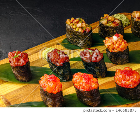 Assorted Gunkan Maki Sushi On Wooden Board Assorted Gunkan Maki Sushi On Wooden Board 140593873