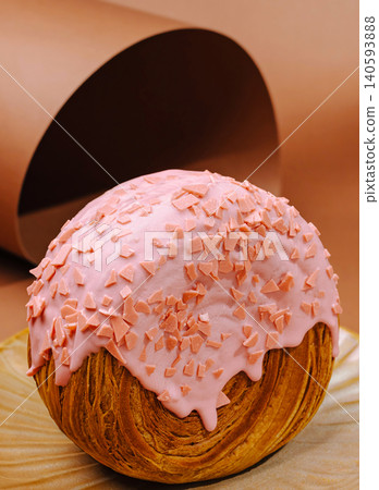 Round Supreme Croissant with Pink Chocolate Glaze Round Supreme Croissant with Pink Chocolate Glaze 140593888