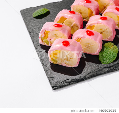 Sweet Dessert Sushi Rolls with Fresh Banana Sweet Dessert Sushi Rolls with Fresh Banana 140593935