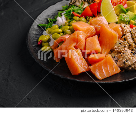 Fresh Salmon Poke Bowl with Avocado and Edamame 140593948