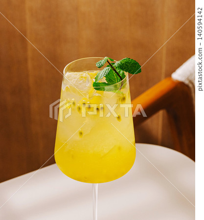 Fresh Passion Fruit Cocktail With Mint And Ice Fresh Passion Fruit Cocktail With Mint And Ice 140594142