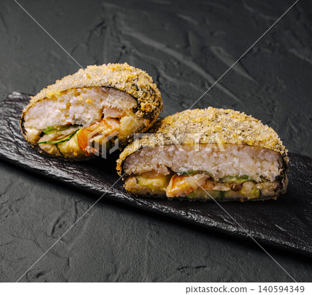 Crispy Deep Fried Sushi Burger Served On Slate Crispy Deep Fried Sushi Burger Served On Slate 140594349