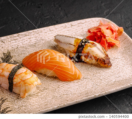 Three Traditional Japanese Nigiri Sushi On Ceramic Plate Three Traditional Japanese Nigiri Sushi On Ceramic Plate 140594400