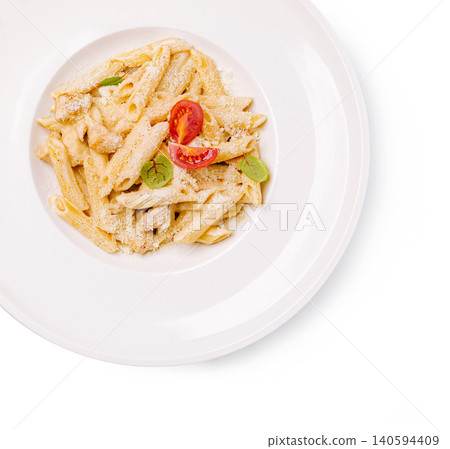 Pasta dish served on a white plate with fresh ingredients and cheese on top Pasta dish served on a white plate with fresh ingredients and cheese on top 140594409