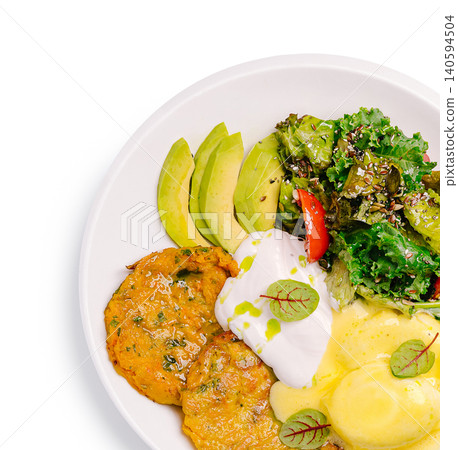 Healthy Breakfast Plate With Eggs Benedict And Avocado Healthy Breakfast Plate With Eggs Benedict And Avocado 140594504