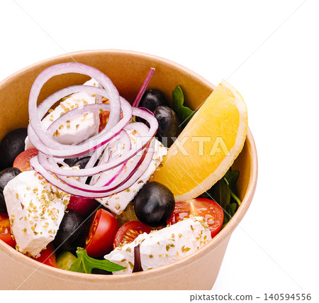 Fresh salad with mixed vegetables and feta cheese served in bowl Fresh salad with mixed vegetables and feta cheese served in bowl 140594556