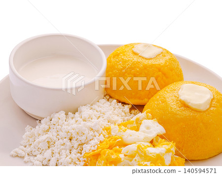 Traditional Yellow Polenta Served With Cheese And Cream Traditional Yellow Polenta Served With Cheese And Cream 140594571