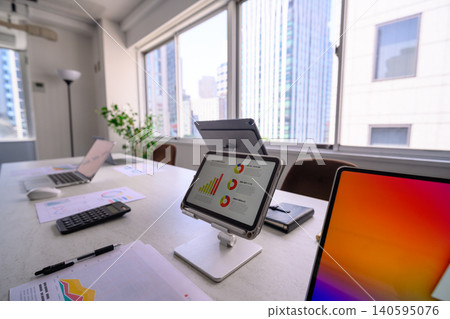 Tablets and documents for use in business meetings Tablets and documents for use in business meetings 140595076