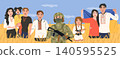 Ukrainian people dressed in vyshyvanka standing behind the military man on the wheat field.  140595525