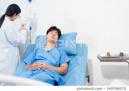 Professional doctor wear white coat uniform checking saline bag for patient at hospital room. Physician man care drip fluid saline bottle. Health care concept. Professional doctor wear white coat uniform checking saline bag for patient at hospital room. Physician man care drip fluid saline bottle. Health care concept. 140596078