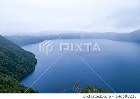 Scenery of Akan-Mashu Quasi-National Park: Lake Mashu shrouded in mist (Mashu 3rd Observatory) Scenery of Akan-Mashu Quasi-National Park: Lake Mashu shrouded in mist (Mashu 3rd Observatory) 140596235