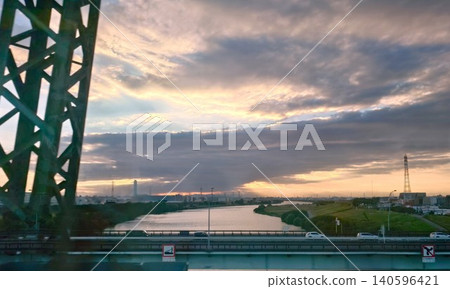 View from the car window - Evening scenery of the great river View from the car window - Evening scenery of the great river 140596421