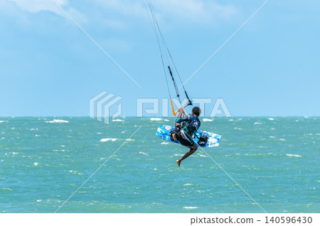 Barra Grande, Brazil - Jan 22, 2026: Kite surfing at Barra Grande beach on the coast of Piaui, northeastern Brazil. Barra Grande, Brazil - Jan 22, 2026: Kite surfing at Barra Grande beach on the coast of Piaui, northeastern Brazil. 140596430