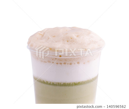 Iced matcha latte with creamy salty milk foam 140596562