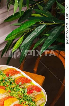 Refreshing citrus salad with grapefruit orange garnishing healthy lunch 140596573
