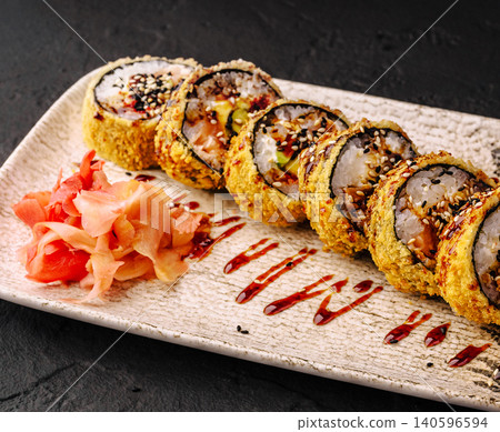 Tempura fried sushi rolls with ginger and eel sauce Tempura fried sushi rolls with ginger and eel sauce 140596594