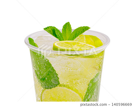 Mojito cocktail with lime slices and fresh mint leaves Mojito cocktail with lime slices and fresh mint leaves 140596669