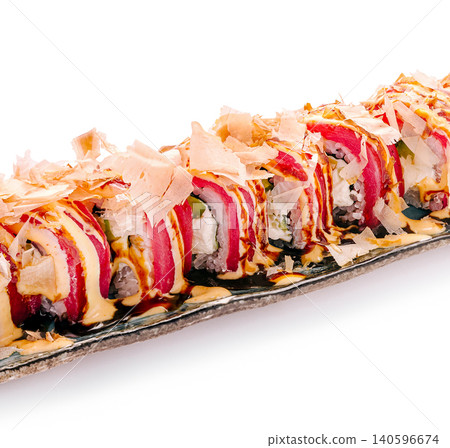 Sushi tuna roll with bonito flakes and sauce 140596674