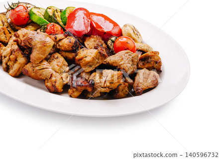 Grilled pork meat cubes with roasted vegetables platter Grilled pork meat cubes with roasted vegetables platter 140596732