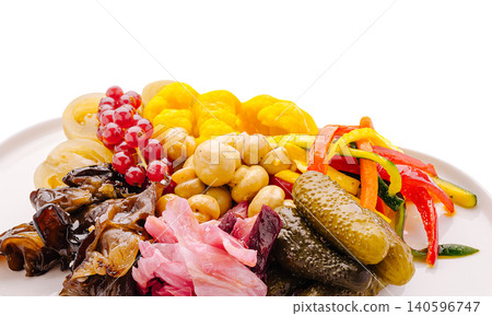 Assortment of pickled vegetables and mushrooms on plate Assortment of pickled vegetables and mushrooms on plate 140596747