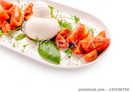 Burrata cheese with fresh tomatoes and basil salad Burrata cheese with fresh tomatoes and basil salad 140596769