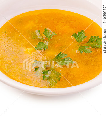 Chicken soup with parsley in white bowl Chicken soup with parsley in white bowl 140596771
