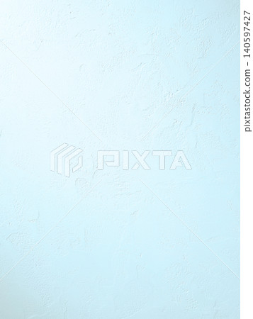 A vertical background image featuring a plaster wall with visible trowel marks, illuminated by a bright, light blue light. A vertical background image featuring a plaster wall with visible trowel marks, illuminated by a bright, light blue light. 140597427