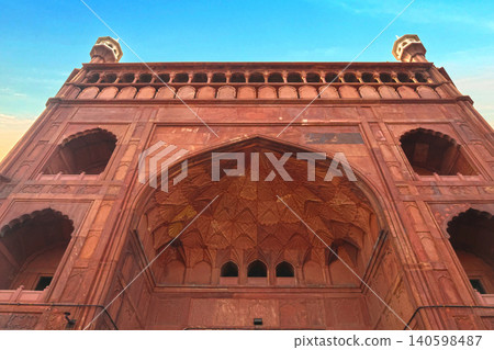 Delhi, India, November 28, 2025. Detailed Architectural View of Jama Masjids Grand Entrance Facade at Sunset Delhi, India, November 28, 2025. Detailed Architectural View of Jama Masjids Grand Entrance Facade at Sunset 140598487
