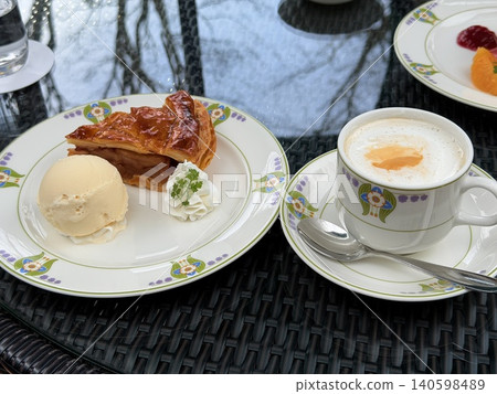 A traditional apple pie and vanilla ice cream dessert plate to enjoy at a cafe in Karuizawa, Nagano Prefecture. A traditional apple pie and vanilla ice cream dessert plate to enjoy at a cafe in Karuizawa, Nagano Prefecture. 140598489