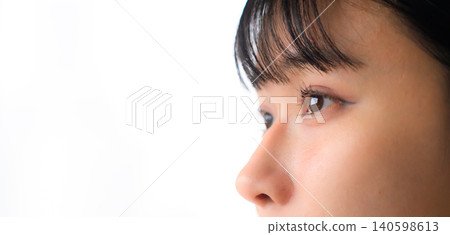 Woman looking out the window Woman looking out the window 140598613