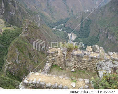 The view of the valley from the Machu Picchu ruins. The view of the valley from the Machu Picchu ruins. 140599027