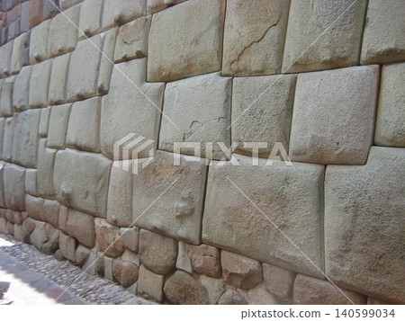 Intricate polygonal stonework remains in Cusco, Peru. 140599034