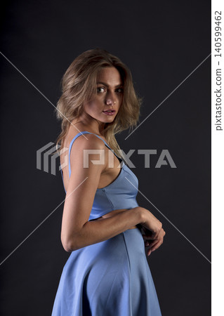 portrait of a young attractive woman on a dark background portrait of a young attractive woman on a dark background 140599462