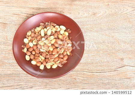 baked salty red peel peanut arranging on plate baked salty red peel peanut arranging on plate 140599512