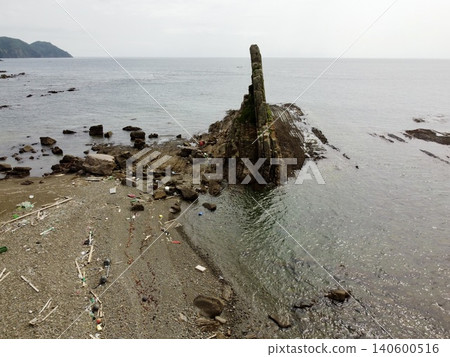 Aerial view of the unique rock formation, Onnaren no Tateishi, located on Tsushima Island in Nagasaki Prefecture. Aerial view of the unique rock formation, Onnaren no Tateishi, located on Tsushima Island in Nagasaki Prefecture. 140600516
