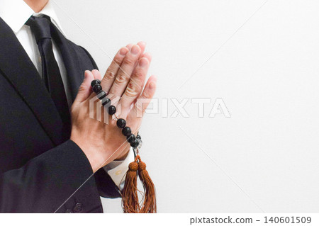 Mourning clothes and prayer beads Mourning clothes and prayer beads 140601509