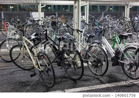 The bicycle parking area at the station in the dead of night The bicycle parking area at the station in the dead of night 140601756