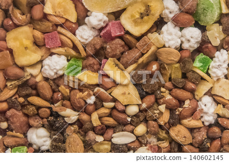 Background healthy food organic snacks dried fruits dried nuts mix ingredient Background healthy food organic snacks dried fruits dried nuts mix ingredient 140602145
