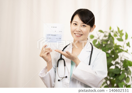 Nurse holding a medicine bag Nurse holding a medicine bag 140602531