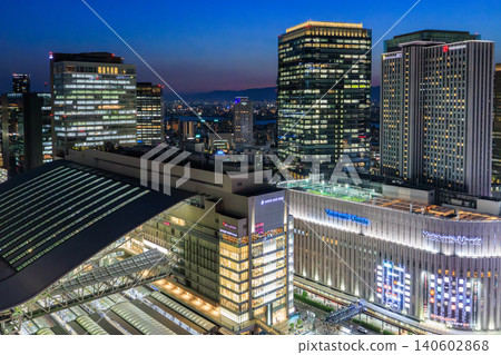 Night view of Osaka Station and the buildings of Umeda (Umeda, Kita-ku, Osaka City) Night view of Osaka Station and the buildings of Umeda (Umeda, Kita-ku, Osaka City) 140602868