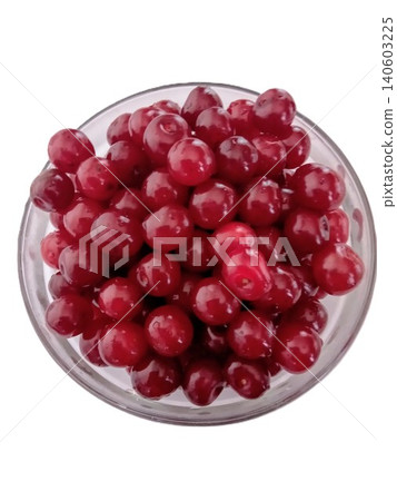 A bowl of red cherries sits on a white background The cherries are ripe and ready to eat A bowl of red cherries sits on a white background The cherries are ripe and ready to eat 140603225