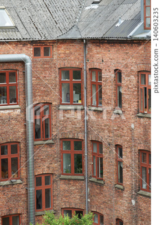 Town, building and apartment with vintage architecture for historic, classic and ancient design in England. Traditional cultural and structure with residential property in small neighborhood Town, building and apartment with vintage architecture for historic, classic and ancient design in England. Traditional cultural and structure with residential property in small neighborhood 140603235