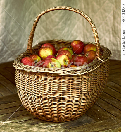 Closeup, apple and basket for autumn, still life and artwork of healthy, food or agriculture. Organic, fruit and floor for ecosystem, sustainability or zero waste for natural eco friendly snack Closeup, apple and basket for autumn, still life and artwork of healthy, food or agriculture. Organic, fruit and floor for ecosystem, sustainability or zero waste for natural eco friendly snack 140603280