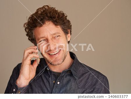 Mature man, phone call and smile in studio for thinking, listening and chat for news with connection background. Person, smartphone and happy with ideas for conversation, contact or mobile networking Mature man, phone call and smile in studio for thinking, listening and chat for news with connection background. Person, smartphone and happy with ideas for conversation, contact or mobile networking 140603377