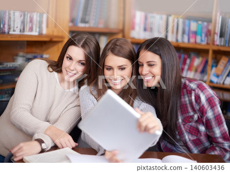 Young women, students or tablet selfie in library or bonding together for support in university. Friends, technology or update on social media for profile picture or solidarity as break in college Young women, students or tablet selfie in library or bonding together for support in university. Friends, technology or update on social media for profile picture or solidarity as break in college 140603436