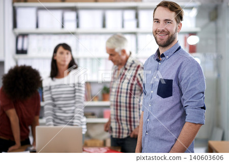 Businessman, portrait and smile in creative studio with colleagues for start up collaboration, project planning or research. Male person, face and small business entrepreneur, teamwork or company Businessman, portrait and smile in creative studio with colleagues for start up collaboration, project planning or research. Male person, face and small business entrepreneur, teamwork or company 140603606