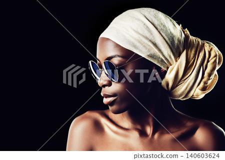 Black woman, sunglasses and scarf with fashion for style on a dark studio background. Face of young African female person, profile or model with headwear and eyewear for stylish accessories on mockup Black woman, sunglasses and scarf with fashion for style on a dark studio background. Face of young African female person, profile or model with headwear and eyewear for stylish accessories on mockup 140603624