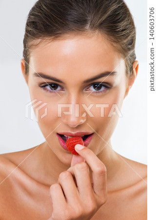 Woman, portrait and raspberry for wellness in studio for health detox, healthy eating and nutrition diet. Model, person and fruit for organic cosmetics, natural beauty or skincare on white background Woman, portrait and raspberry for wellness in studio for health detox, healthy eating and nutrition diet. Model, person and fruit for organic cosmetics, natural beauty or skincare on white background 140603706