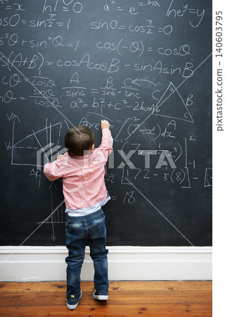 Child, math and blackboard with writing in classroom for knowledge, development and young genius in school. Kid, numbers and formula on chalkboard with learning for education, growth and solution 140603795